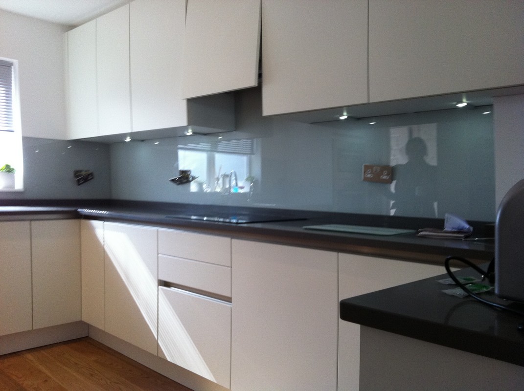 Grey glass kitchen splashback with LED lighting in Chiswick